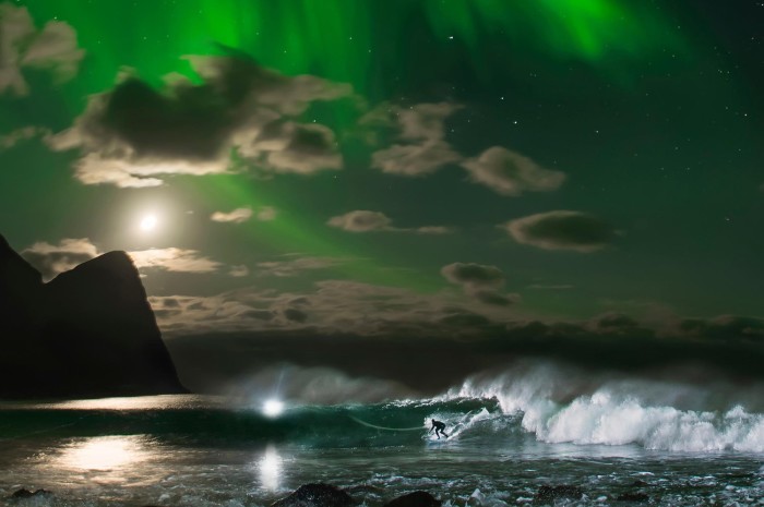 Mick Fanning surfs the Northern Lights